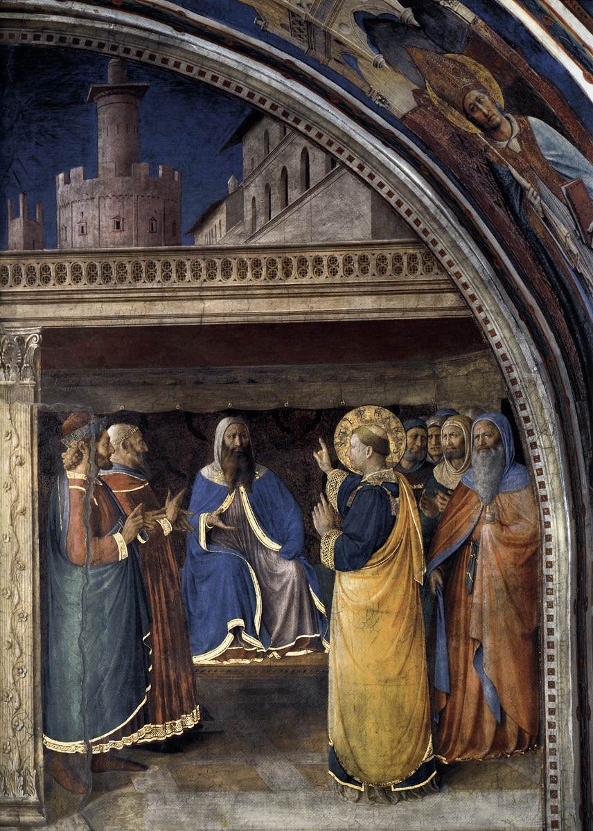Stephen raises a finger while addressing a seated authority in blue beneath a dark canopy, surrounded by men.