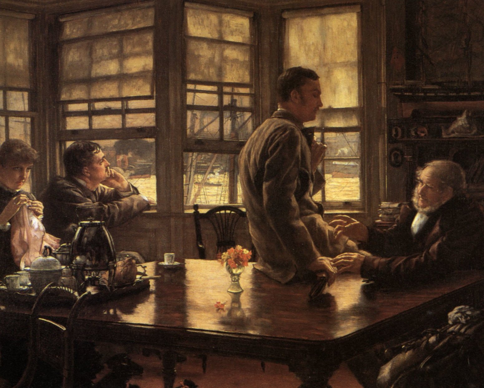 A young man sits on the table’s edge as his father leans toward him with one hand on his and the other raised; two figures sit beside windows overlooking ships.