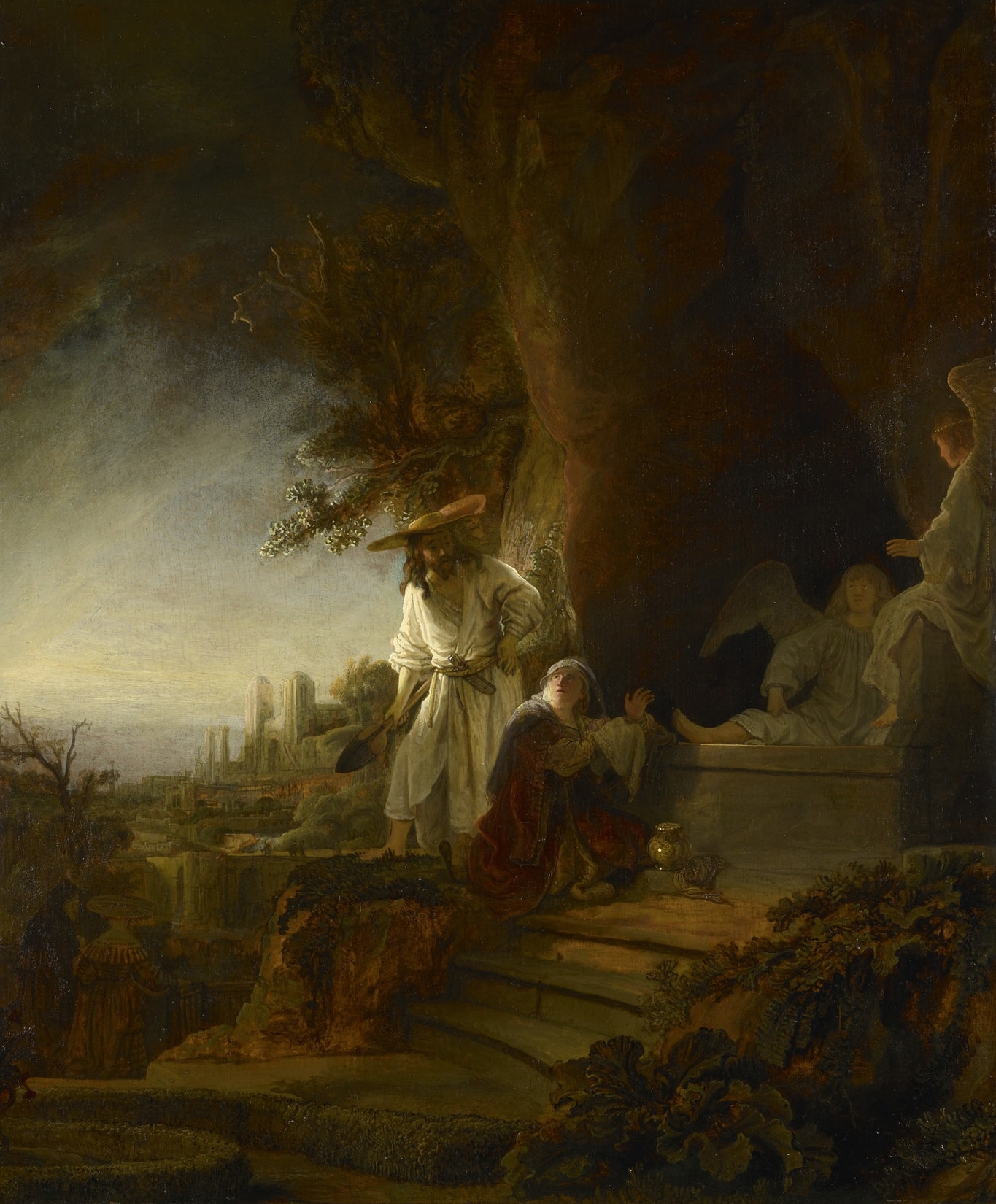 A dark rocky mass encloses the right side, while dawn opens the city view at the left. Christ appears in a broad gardener’s hat, standing just behind the kneeling Mary.