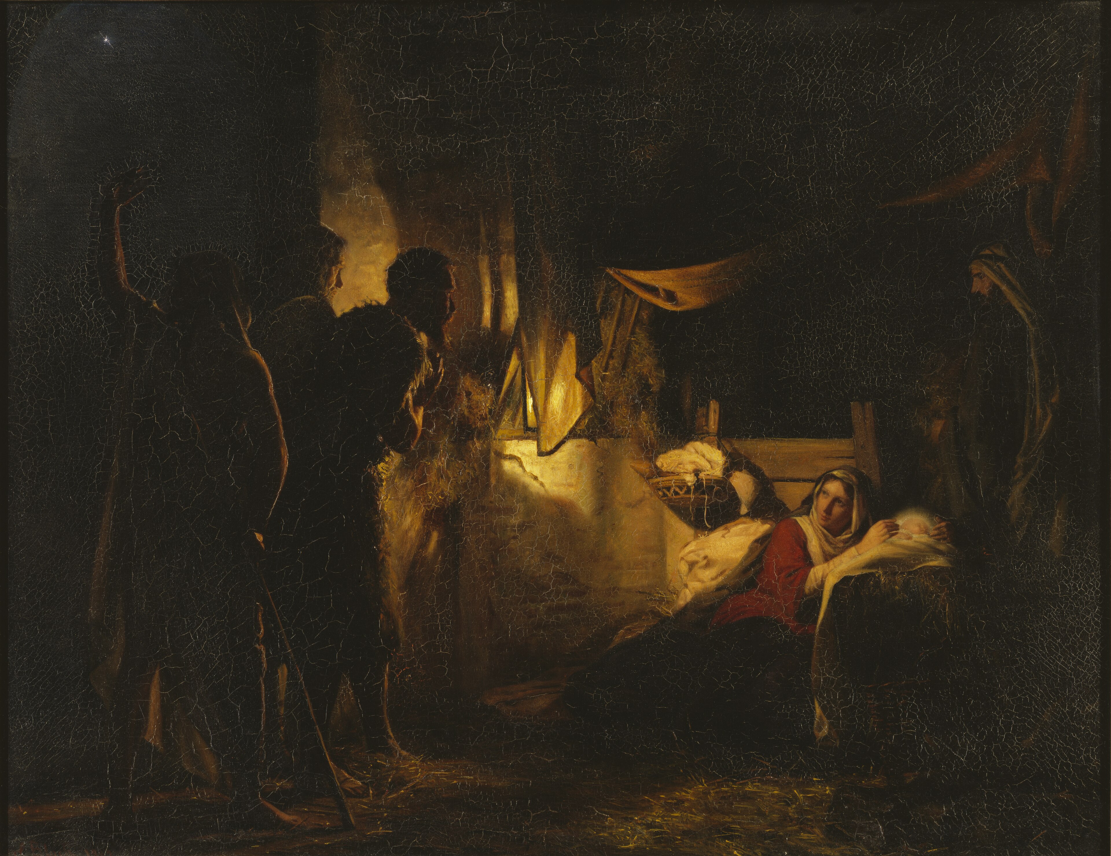 Shepherds gather in a dark shelter around Mary and the infant Jesus, whose small resting place glows with warm light.