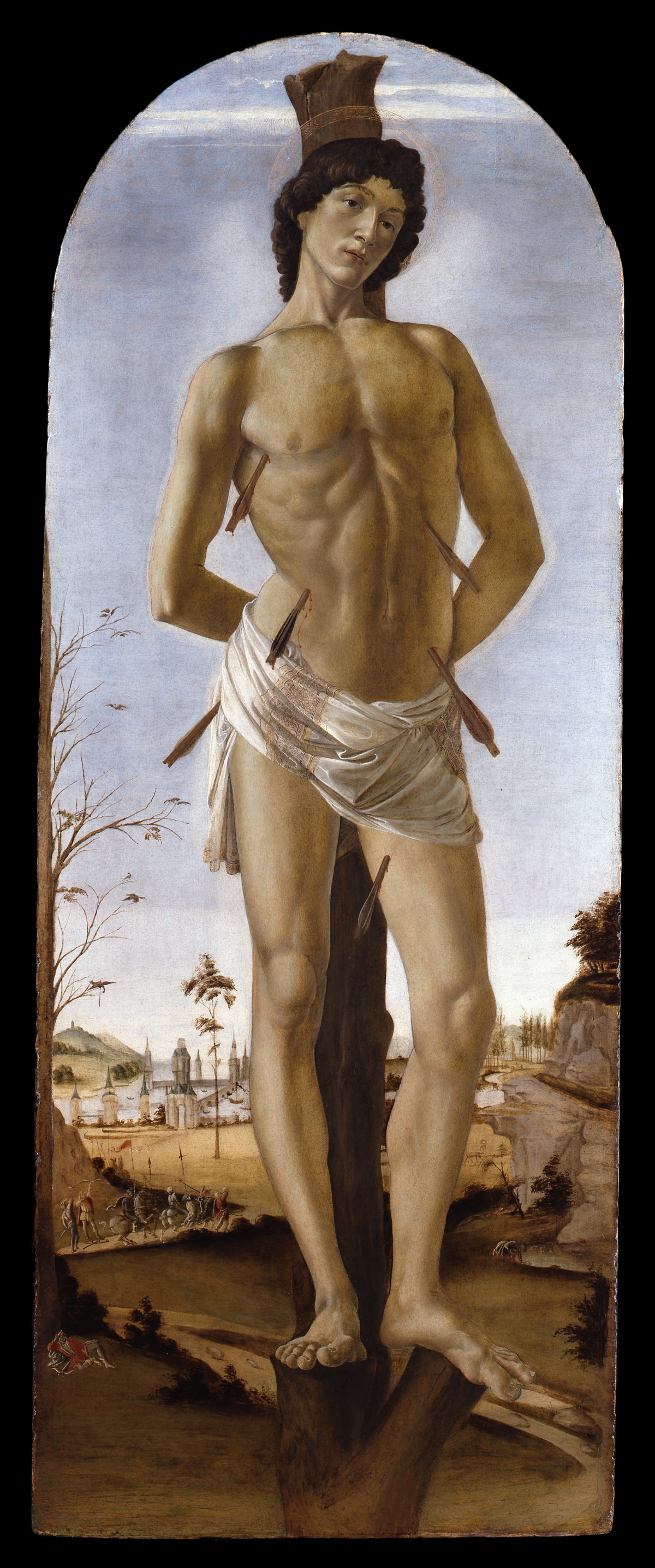 Saint Sebastian stands tied to a tree stump, his body pierced by arrows, before a distant river landscape.