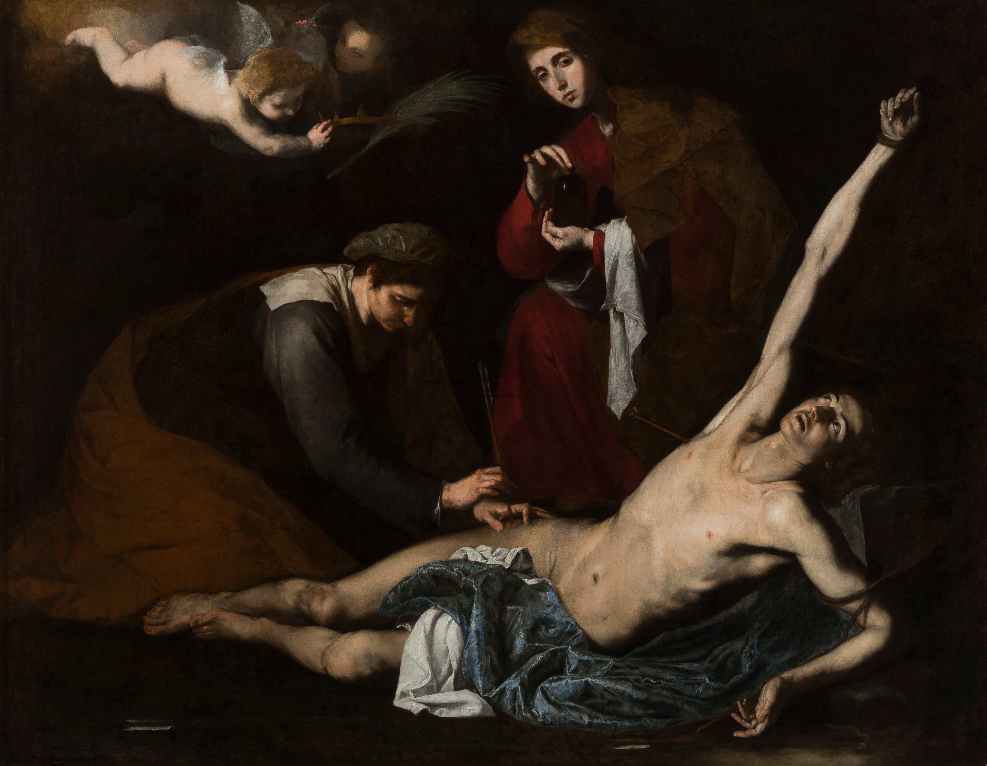 Sebastian lies diagonally across dark blue cloth with one arm raised as two women tend him and small angels hover overhead.